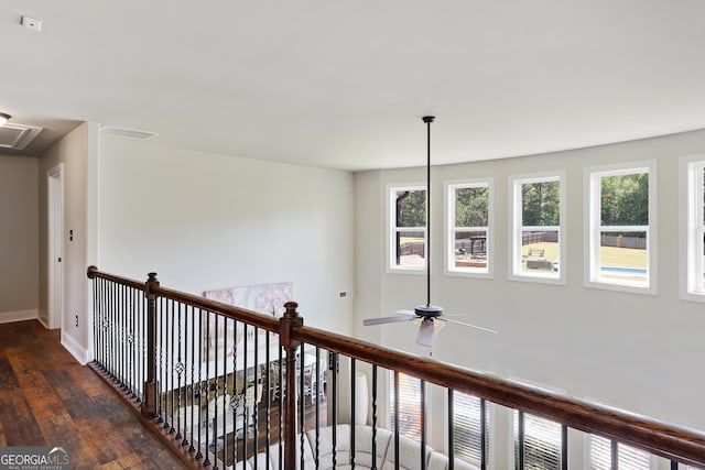 hall with dark hardwood / wood-style flooring