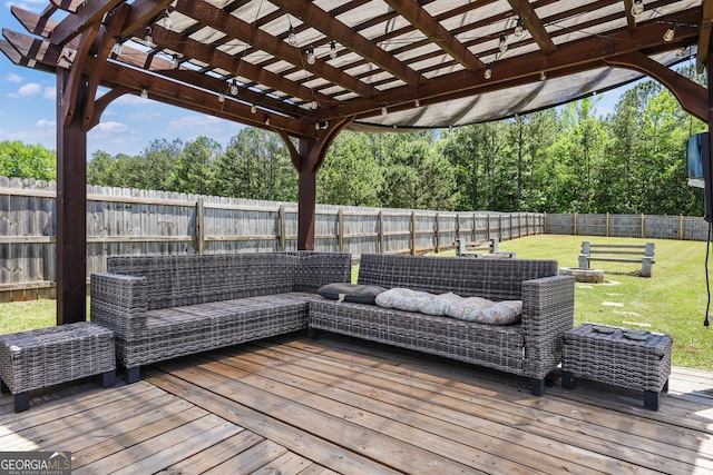 wooden deck with a pergola and a lawn