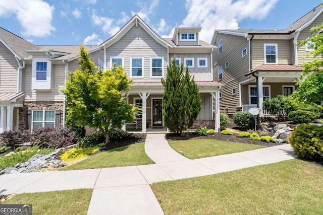 view of front of home with a front yard