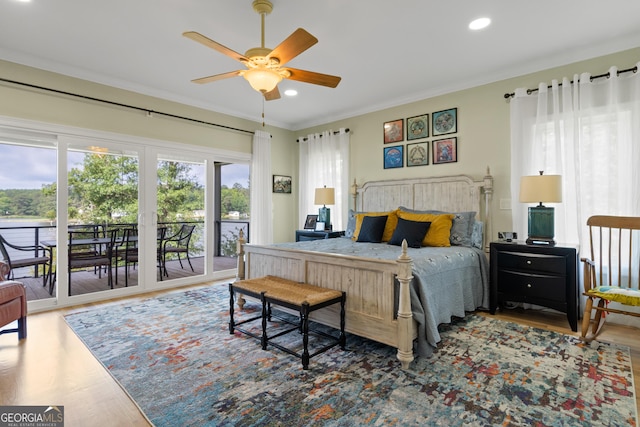 bedroom with ceiling fan, access to exterior, ornamental molding, and hardwood / wood-style floors