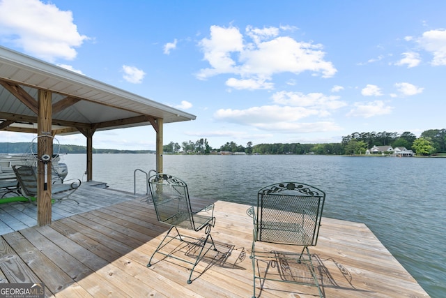 dock area with a water view