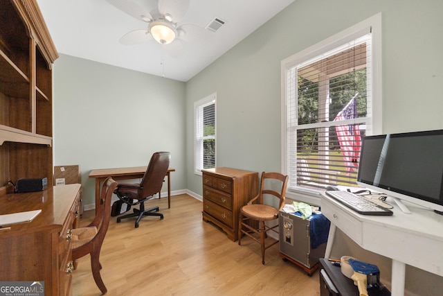 office featuring ceiling fan and light hardwood / wood-style flooring