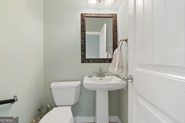 bathroom with sink and toilet