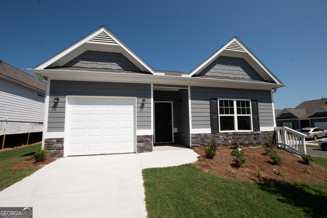 craftsman-style home featuring a garage