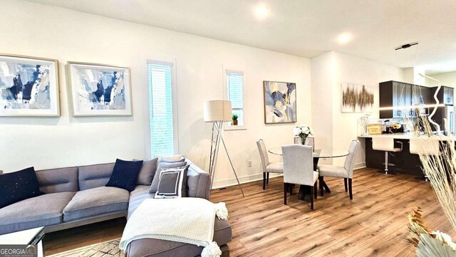 dining space featuring light hardwood / wood-style floors