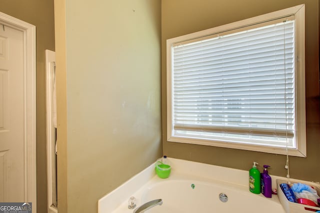 bathroom with a tub