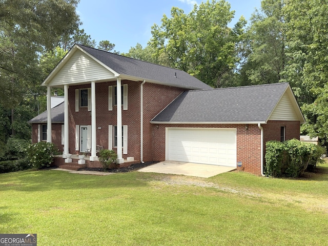 greek revival inspired property featuring a front lawn and a garage