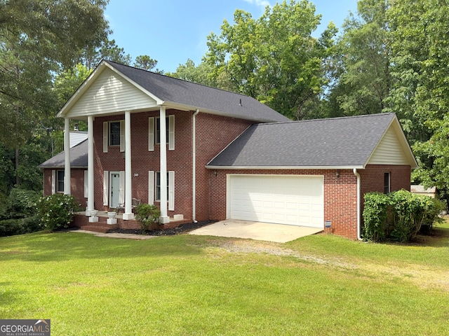 greek revival house with a garage and a front lawn