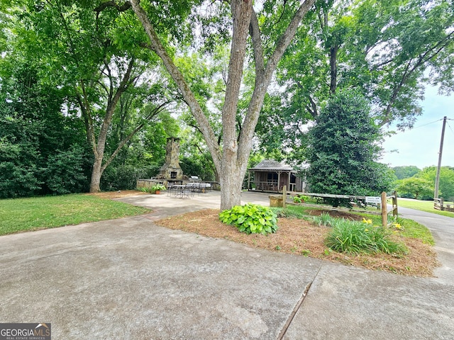 view of property hidden behind natural elements