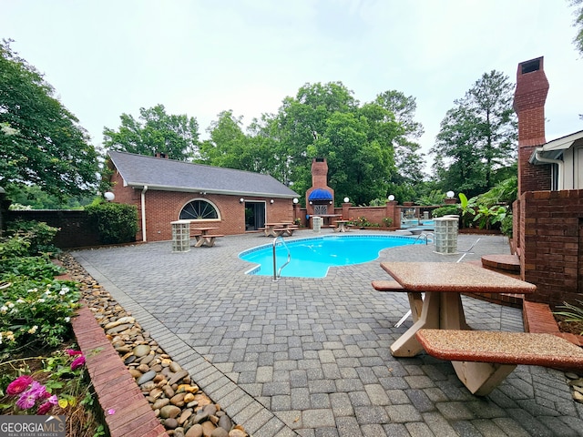 view of pool with a patio