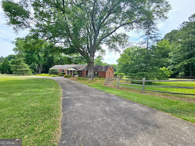 view of front of property with a front lawn