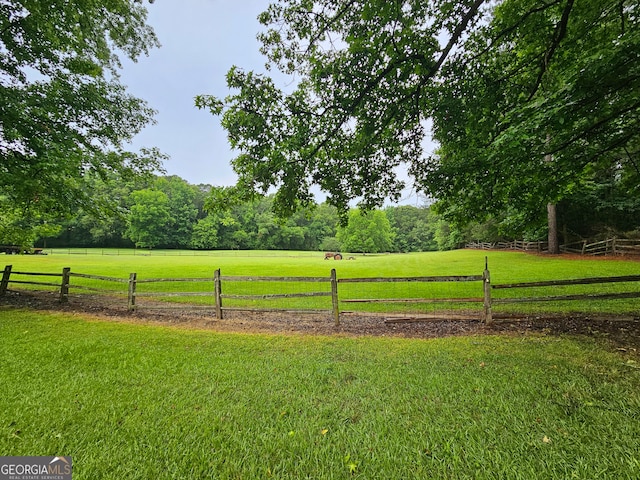 view of yard featuring a rural view