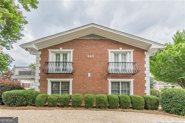 view of property exterior featuring a balcony