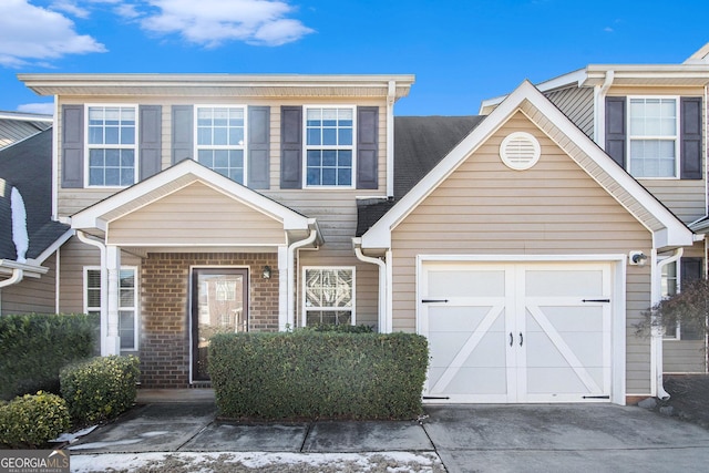 view of front of home with a garage