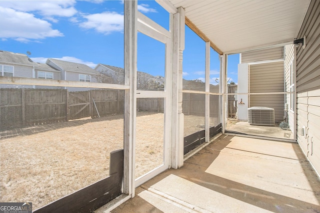 unfurnished sunroom featuring a healthy amount of sunlight