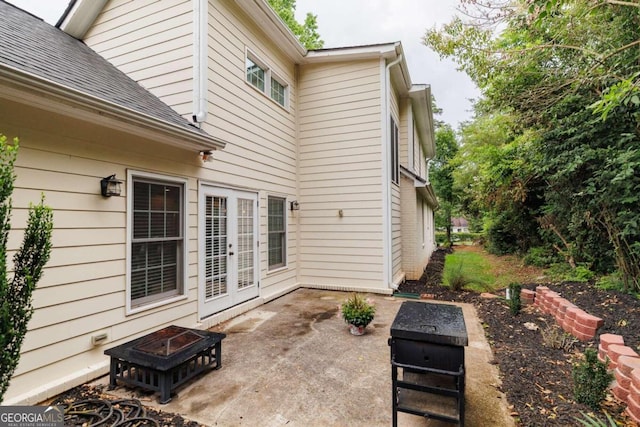 view of patio / terrace with a fire pit