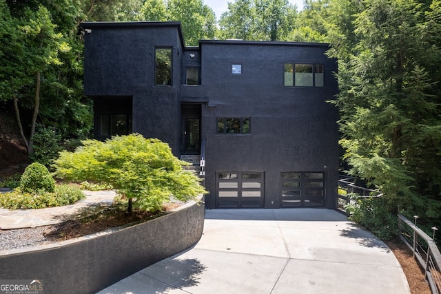 contemporary home featuring a garage