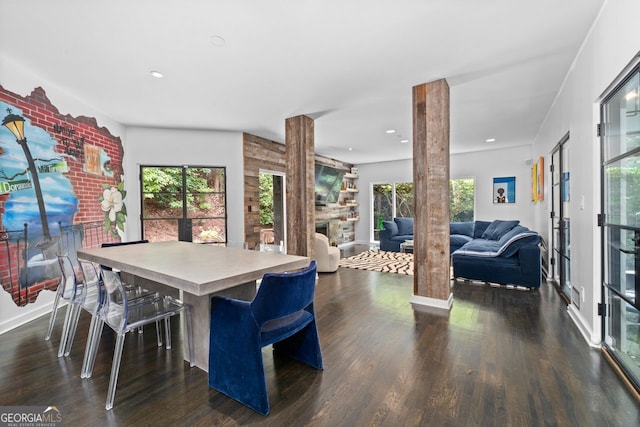 dining space featuring dark hardwood / wood-style flooring