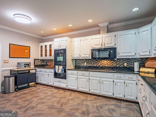 kitchen with black appliances and white cabinets