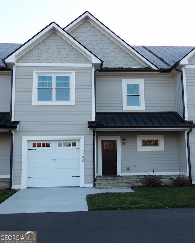 view of front of home with a garage