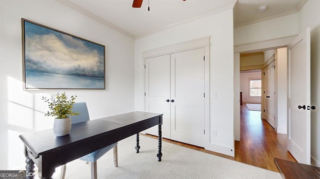 home office featuring ceiling fan and hardwood / wood-style floors