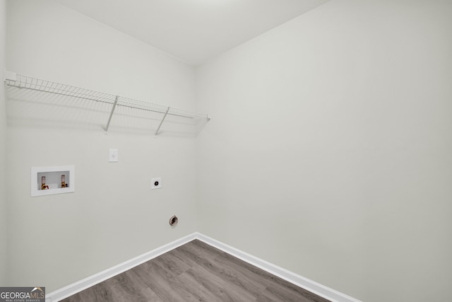 1216 Trophy Club Ave, Dacula, GA 30019 - laundry area with hardwood / wood-style flooring, hookup for an electric dryer, and hookup for a washing machine