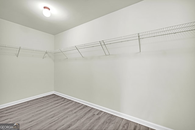 1216 Trophy Club Ave, Dacula, GA 30019 - spacious closet with wood-type flooring
