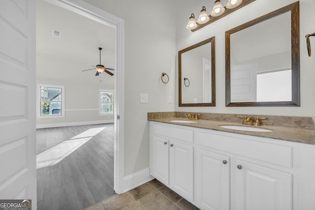 1216 Trophy Club Ave, Dacula, GA 30019 - bathroom with tile floors, ceiling fan, and double sink vanity