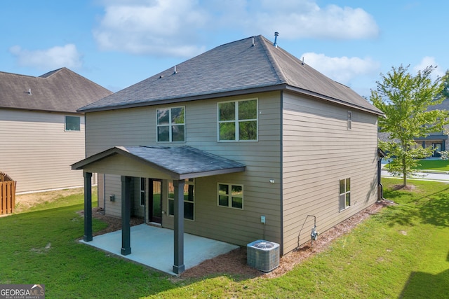 1216 Trophy Club Ave, Dacula, GA 30019 - back of property featuring a patio, central AC, and a yard