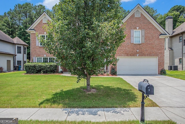 view of front property featuring a garage, central air condition unit, and a front lawn