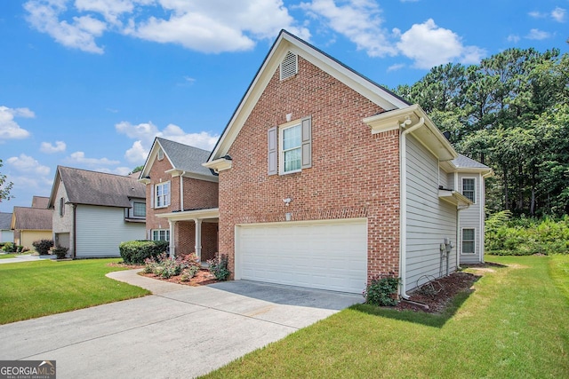 view of front of home featuring a front yard and a garage