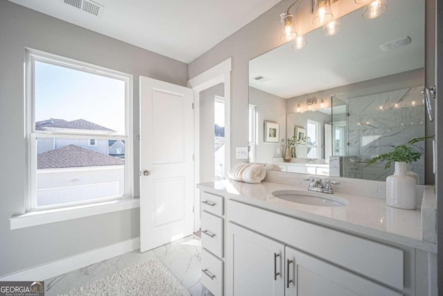 bathroom with vanity and walk in shower