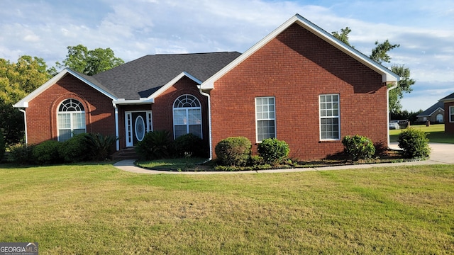 view of front of house with a front lawn