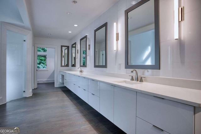 bathroom featuring hardwood / wood-style floors and vanity