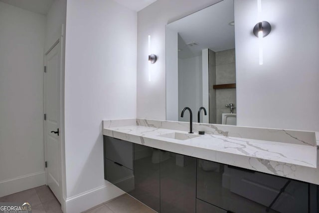 bathroom with vanity and tile patterned floors