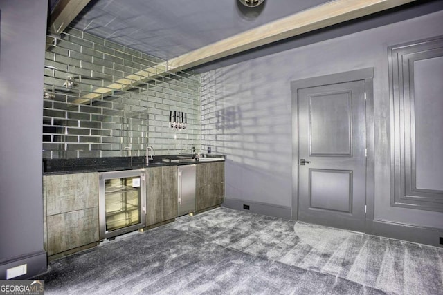 bar with beam ceiling, wine cooler, and carpet