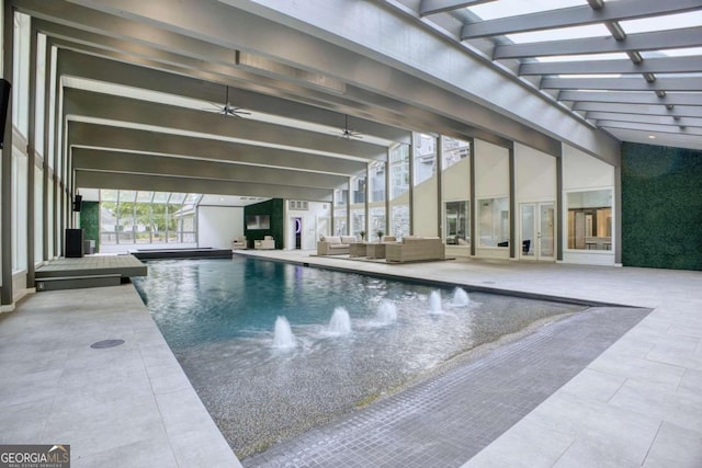 view of pool featuring outdoor lounge area, ceiling fan, and a patio area