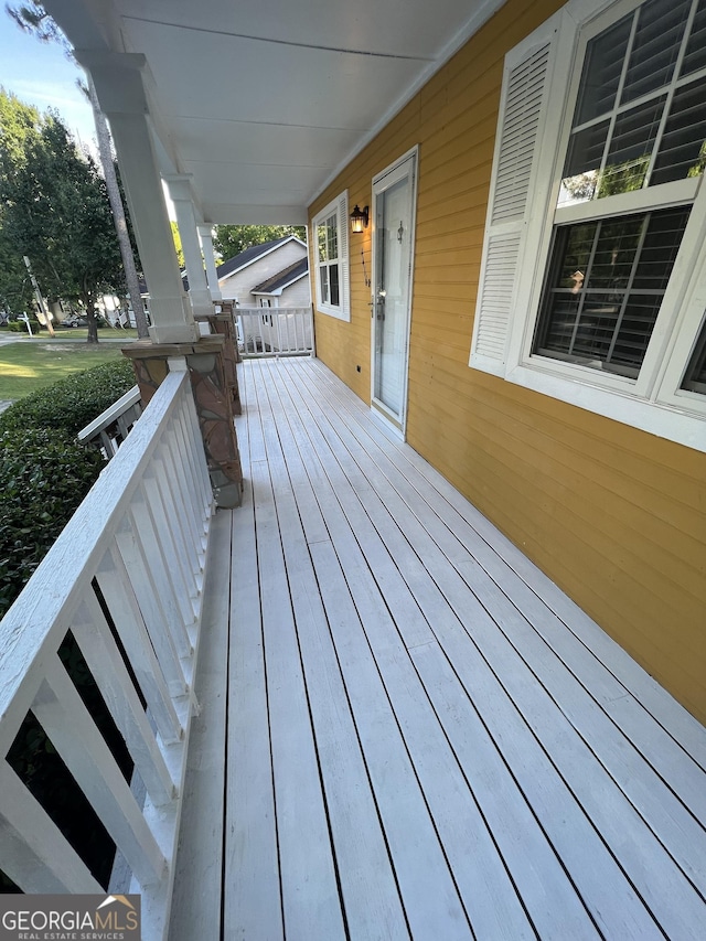 deck with covered porch