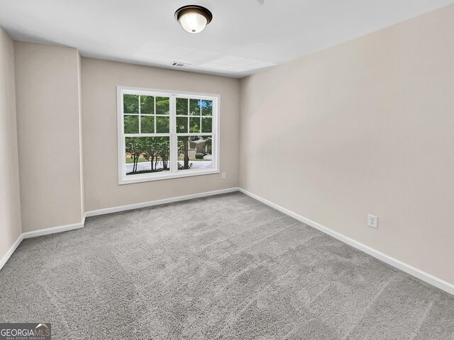 empty room featuring carpet floors