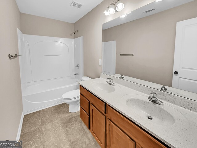 full bathroom with shower / tub combination, vanity, and toilet