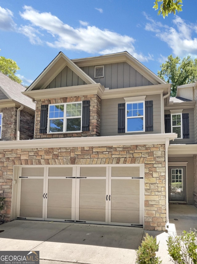 craftsman-style home with a garage