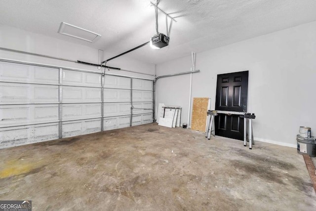 garage featuring a garage door opener