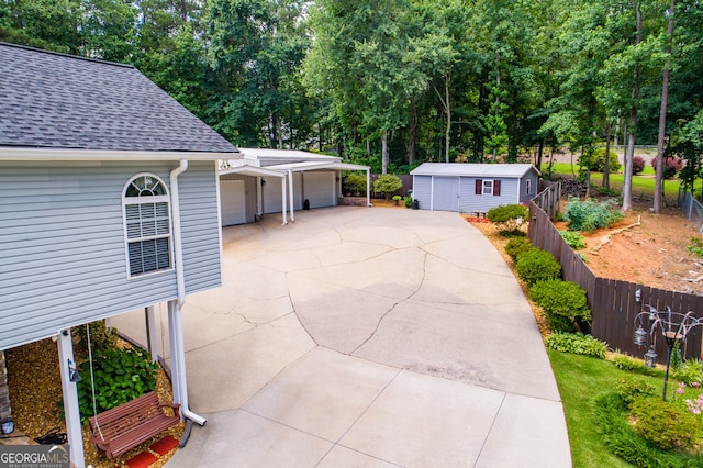 view of front of home with an outdoor structure and a garage