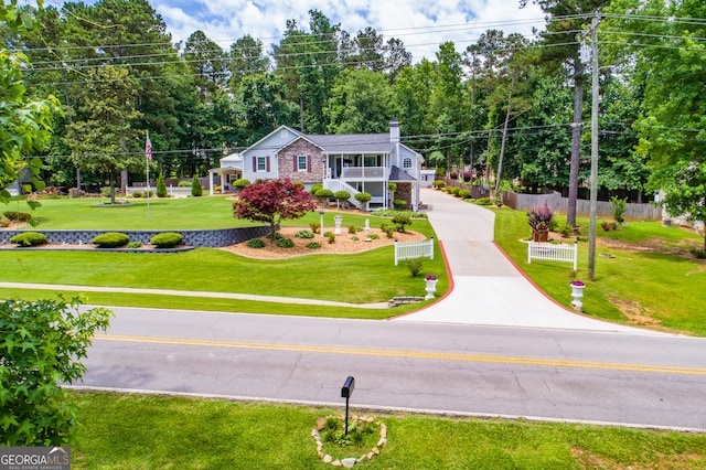 view of front of home with a front yard