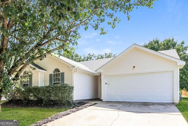 ranch-style house featuring a garage