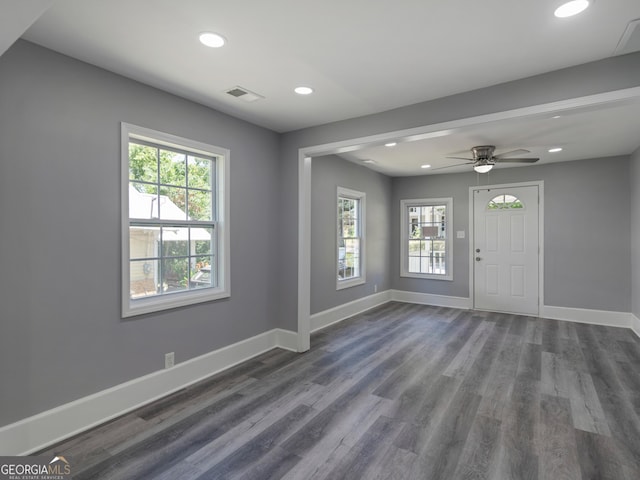 foyer featuring ceiling fan and dark hardwood / wood-style flooring