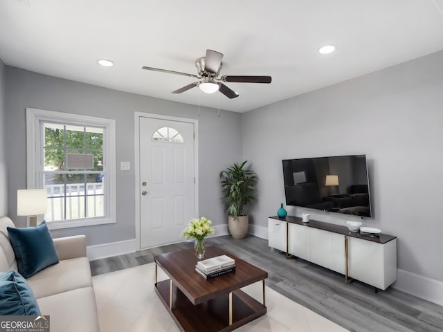 living room featuring ceiling fan