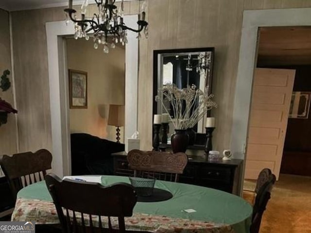 dining room featuring a chandelier