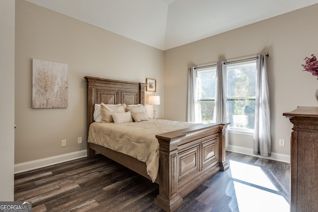 bedroom featuring dark wood-type flooring