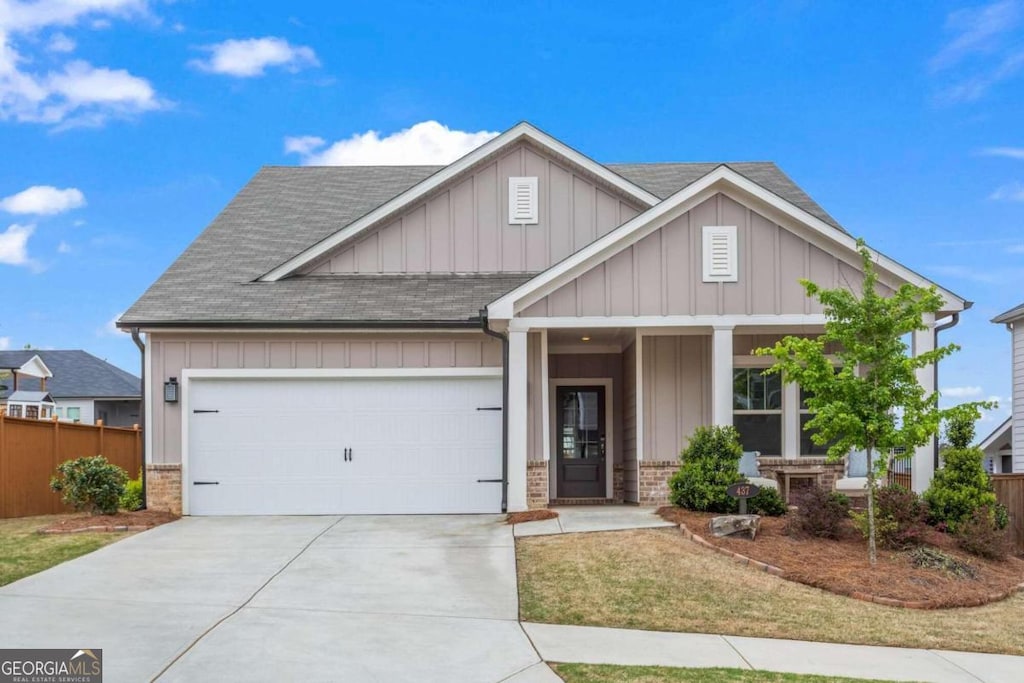 craftsman-style home with a garage